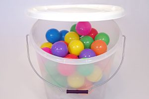 See through container (plastic balls for display purposes only).